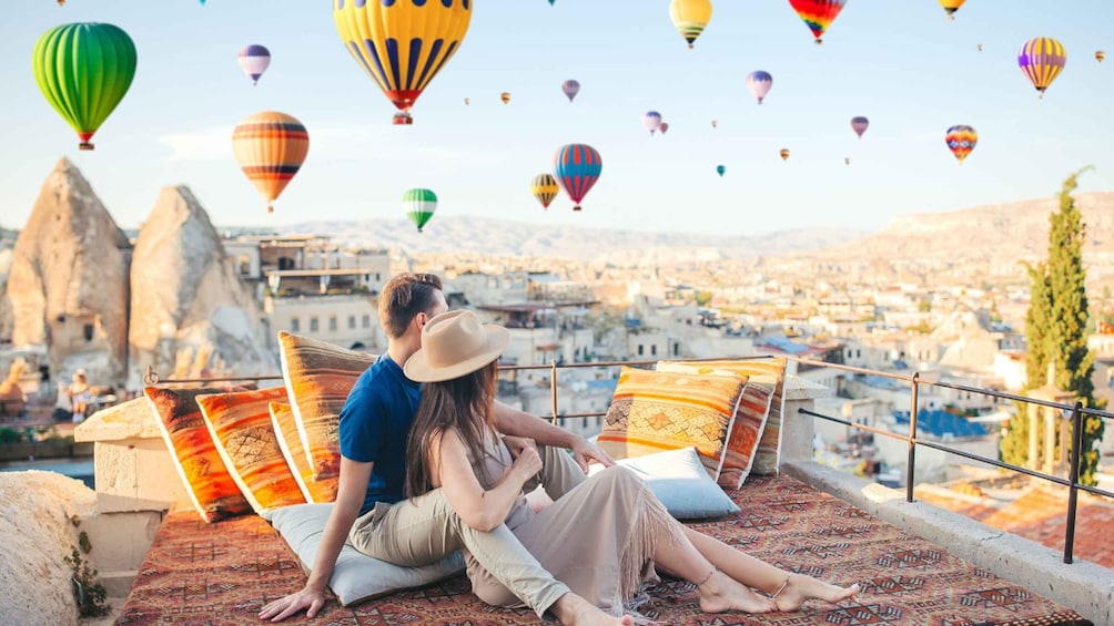 Hot air balloons over Cappadocia at sunrise
